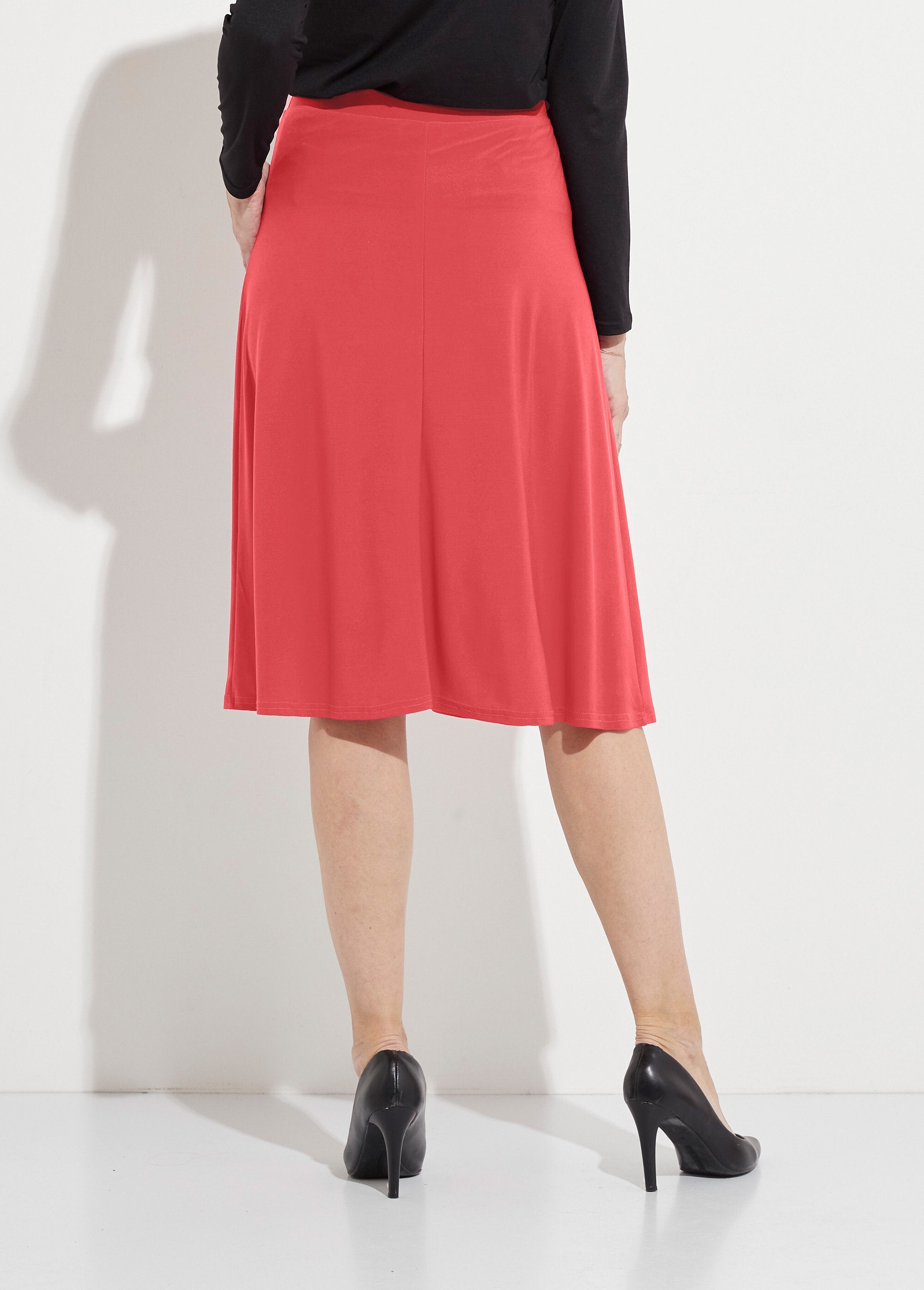 Mid-length_flared_skirt_in_plain_knit_with_bridge_Coral_DO1_slim