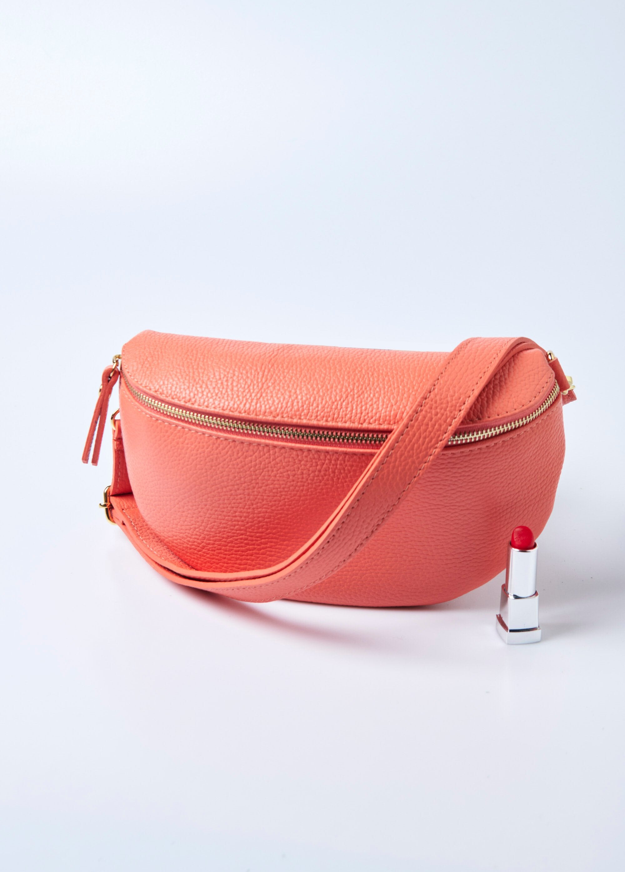 Leather_zipped_fanny_pack_with_shoulder_strap_Coral_orange_FA1_slim